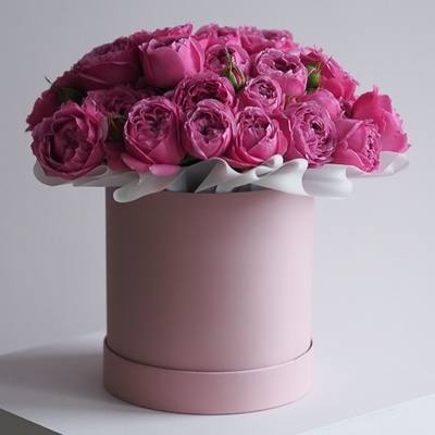 Peony roses in a hat box